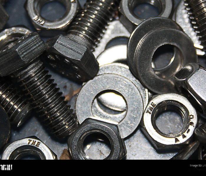 a-pile-of-nutsbolts-and-washers-on-a-table